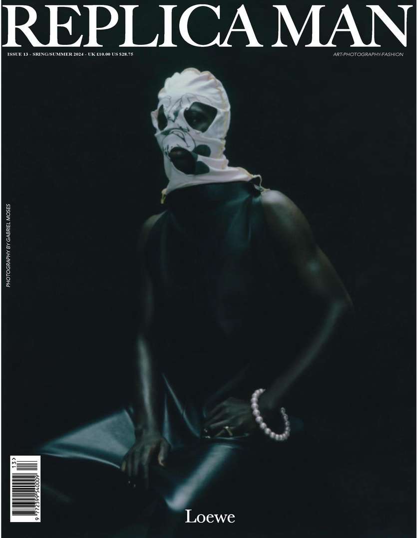 Magazine cover featuring a Black man wearing a white patterned balaclava and pearl bracelet photographed by Gabriel Moses for Replica Man.