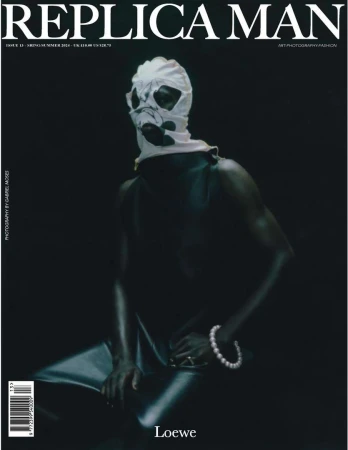 Magazine cover featuring a Black man wearing a white patterned balaclava and pearl bracelet photographed by Gabriel Moses for Replica Man.
