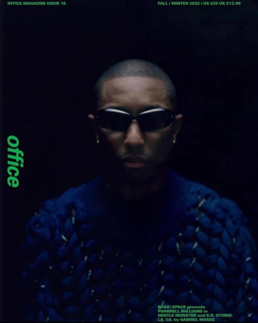 Pharrell Williams magazine cover in blue knit sweater and black sunglasses against a dark backdrop with green Office logo.