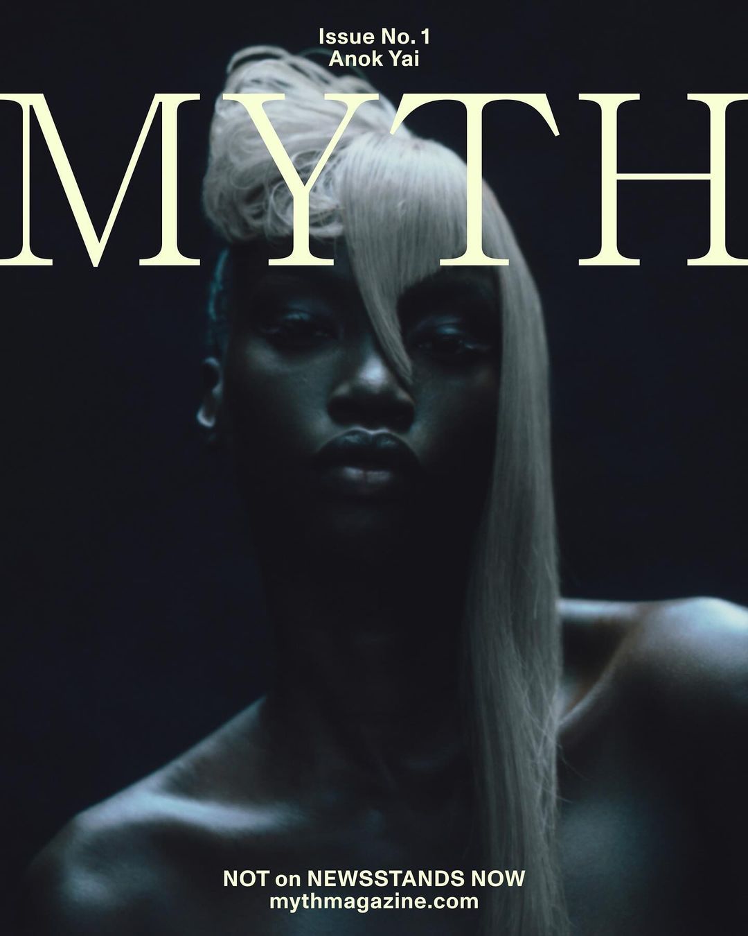 Magazine cover featuring a dark-skinned woman with light hair styled up, against a dark background with 'MYTH' in large white text.