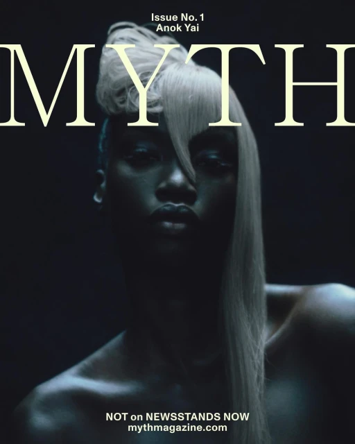 Magazine cover featuring a dark-skinned woman with light hair styled up, against a dark background with 'MYTH' in large white text.