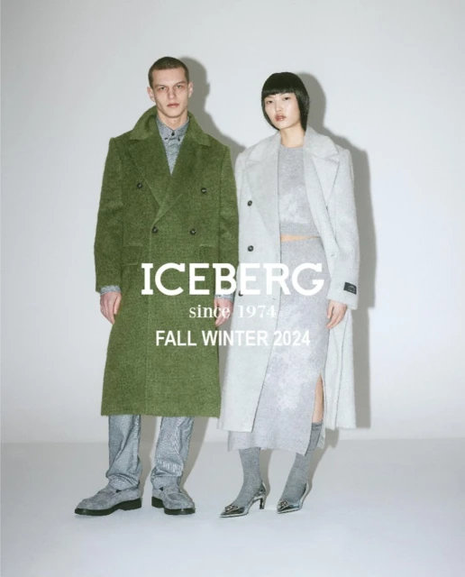 Fashion editorial featuring a male and female model wearing ICEBERG Fall/Winter 2024 collection, posing in a light grey studio.