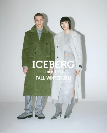Fashion editorial featuring a male and female model wearing ICEBERG Fall/Winter 2024 collection, posing in a light grey studio.