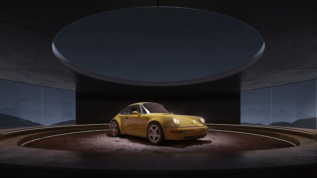 Eye-level shot of a yellow Porsche 911 on a concrete platform inside a dark architectural space with a window showing a landscape.