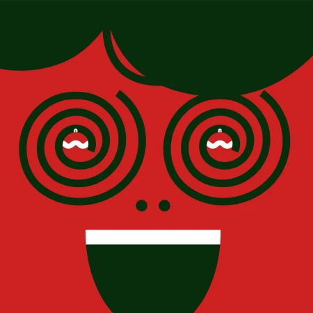 Whimsical graphic illustration of a red face with spiral eyes containing ornament details and a wide, toothy smile on a red background.