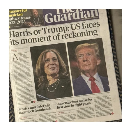 The Guardian newspaper headline featuring portraits of Kamala Harris and Donald Trump above the text "Harris or Trump: US faces its moment of reckoning".