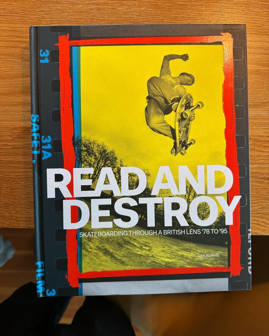 Book cover featuring a skateboarder in mid-air, text reads 'Read and Destroy: Skateboarding Through a British Lens '78 to '95'.