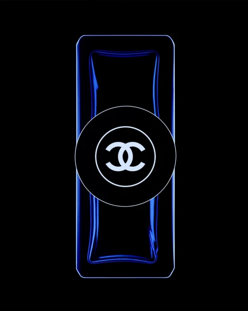 Chanel No. 5 perfume bottle with blue tint and a black background for high contrast and minimalist aesthetic.