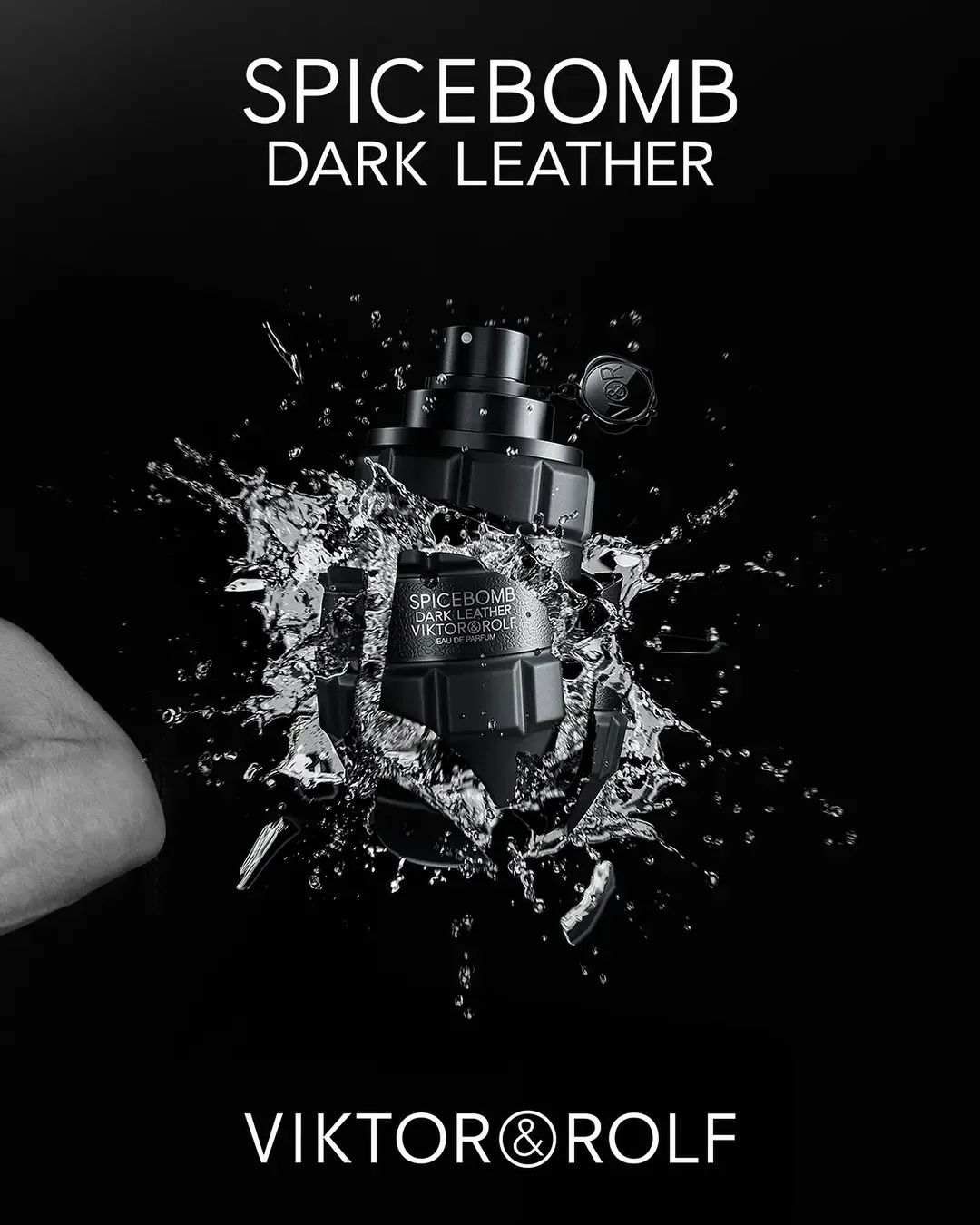 Viktor & Rolf Spicebomb Dark Leather perfume bottle presented against a black background with dynamic water splash effects.