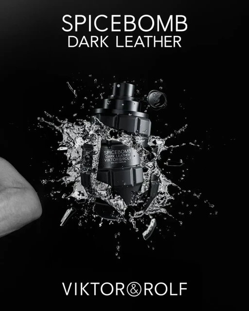 Viktor & Rolf Spicebomb Dark Leather perfume bottle presented against a black background with dynamic water splash effects.