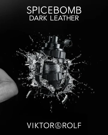 Viktor & Rolf Spicebomb Dark Leather perfume bottle presented against a black background with dynamic water splash effects.