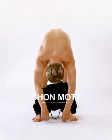 Nude man bends over, head between legs, wearing sweatpants; a fashion shot with the 'SHON MOTT' logo over a white background.