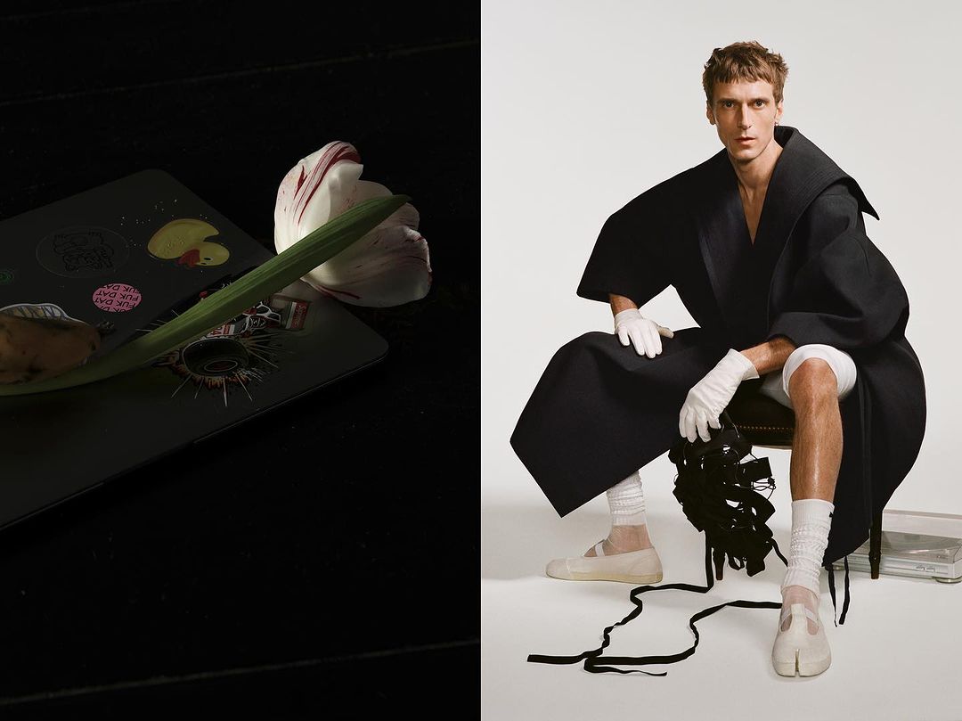 Fashion shot: A man in a black coat and white gloves sits beside a tulip on a laptop, contrasted by black and white sections.