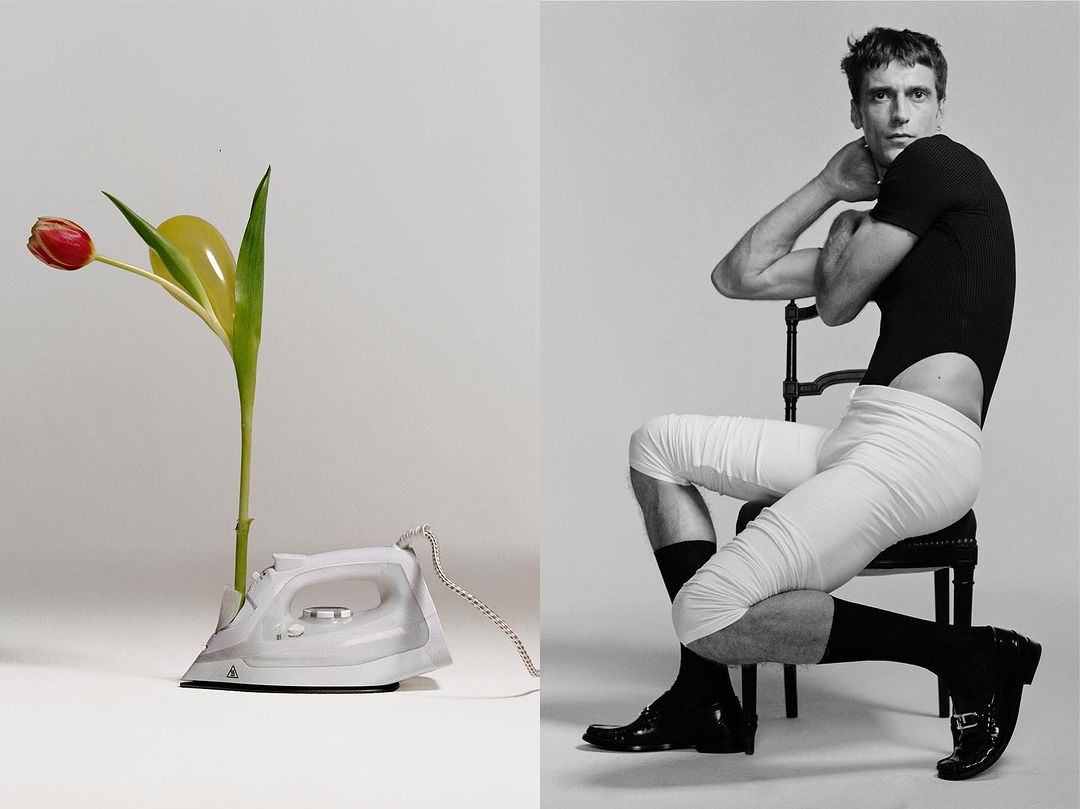 Black and white studio shot of a man in a leotard sitting on a chair alongside an iron with a tulip and balloon coming out of it.