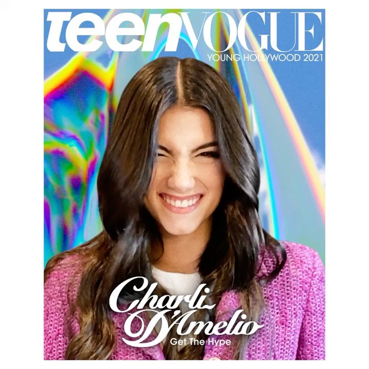 Teen Vogue cover featuring smiling adult female, Charli D'Amelio, wearing pink jacket against a blurred, colorful abstract background.