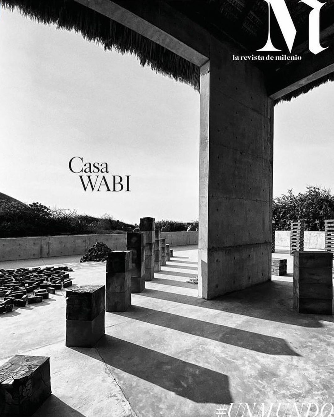 Black and white magazine cover showcasing Casa Wabi, featuring modern architecture, geometric blocks, and shadows under a clear sky.