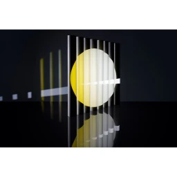 Abstract composition of a bright yellow circular light shining through vertical black pillars with reflections