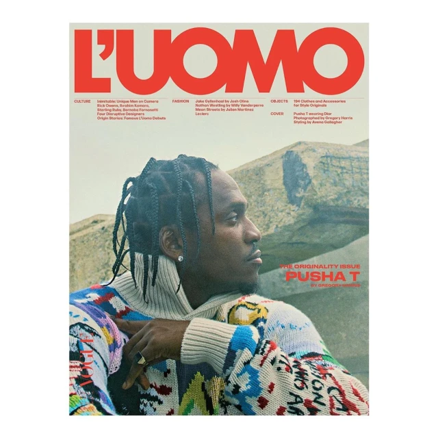 L'Uomo magazine cover featuring Pusha T wearing a patterned sweater with mountains in the background, photographed in medium shot.