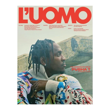 L'Uomo magazine cover featuring Pusha T wearing a patterned sweater with mountains in the background, photographed in medium shot.