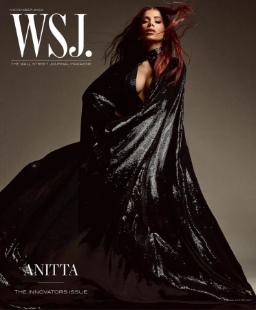 WSJ magazine cover featuring Anitta wearing a shimmering black gown, captured in a medium shot with soft lighting and a neutral background.