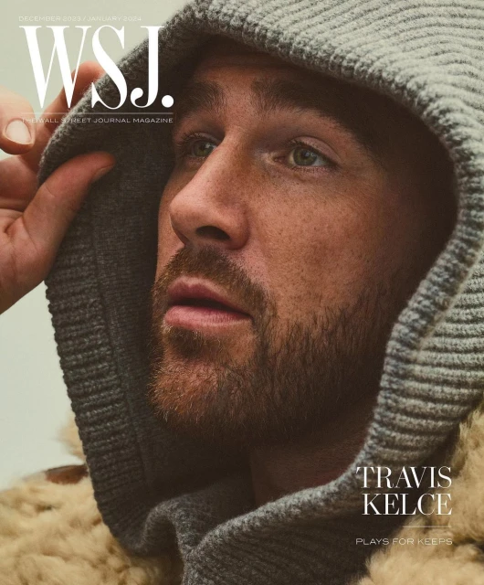 Magazine cover portrait featuring Travis Kelce in a hooded jacket, December 2022/January 2023 issue of WSJ. Magazine.