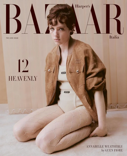 Harper's Bazaar Italia cover featuring a young woman with short brown hair, wearing a brown jacket and knitted tights in a studio setting.