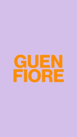 Bright orange sans-serif typography against a vibrant purple background with vertical orientation and centered text layout.