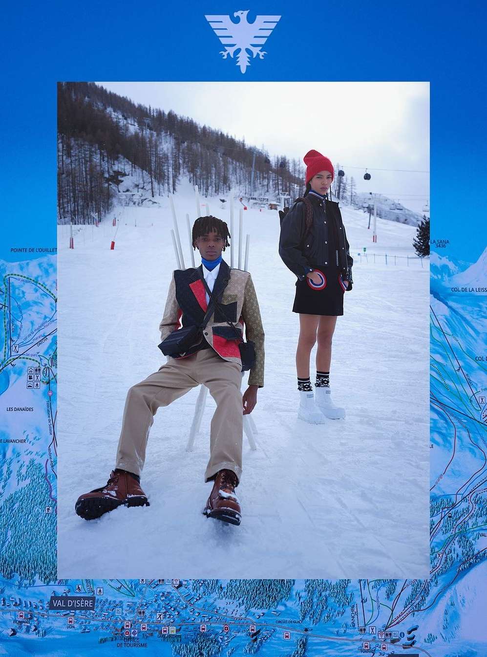 Two fashionable people in snow. Man sitting in designer blazer and woman standing in skirt with a red hat in a winter scene.