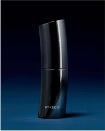 Byredo black curved perfume bottle against a dark blue background with subtle gradient lighting