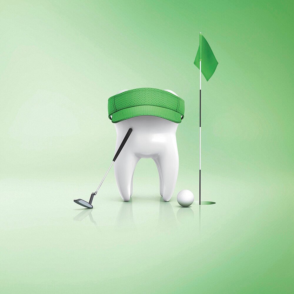 Tooth character wears visor alongside a golf ball and flagstick on green background, promoting oral care and dental health with playful imagery.