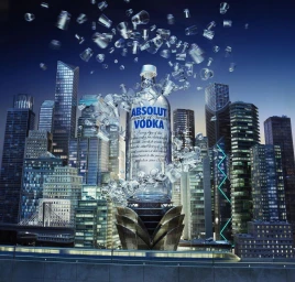 Giant Absolut vodka bottle towering above a glittering city skyline with floating glass tumblers by Hac Job