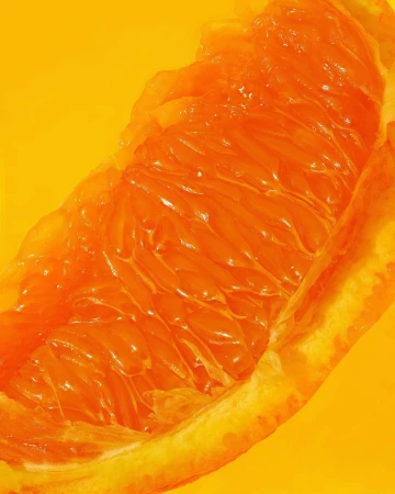 Macro photograph of an orange fruit slice showing the pulpy texture and vibrant color, set against a saturated yellow background.