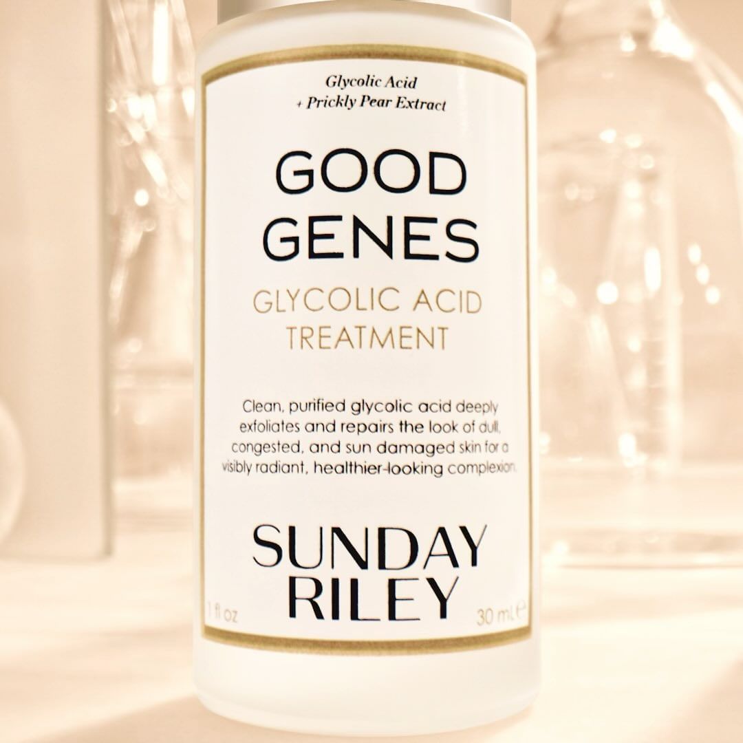 Close-up of Sunday Riley Good Genes Glycolic Acid Treatment bottle with white background, displaying product details and branding.