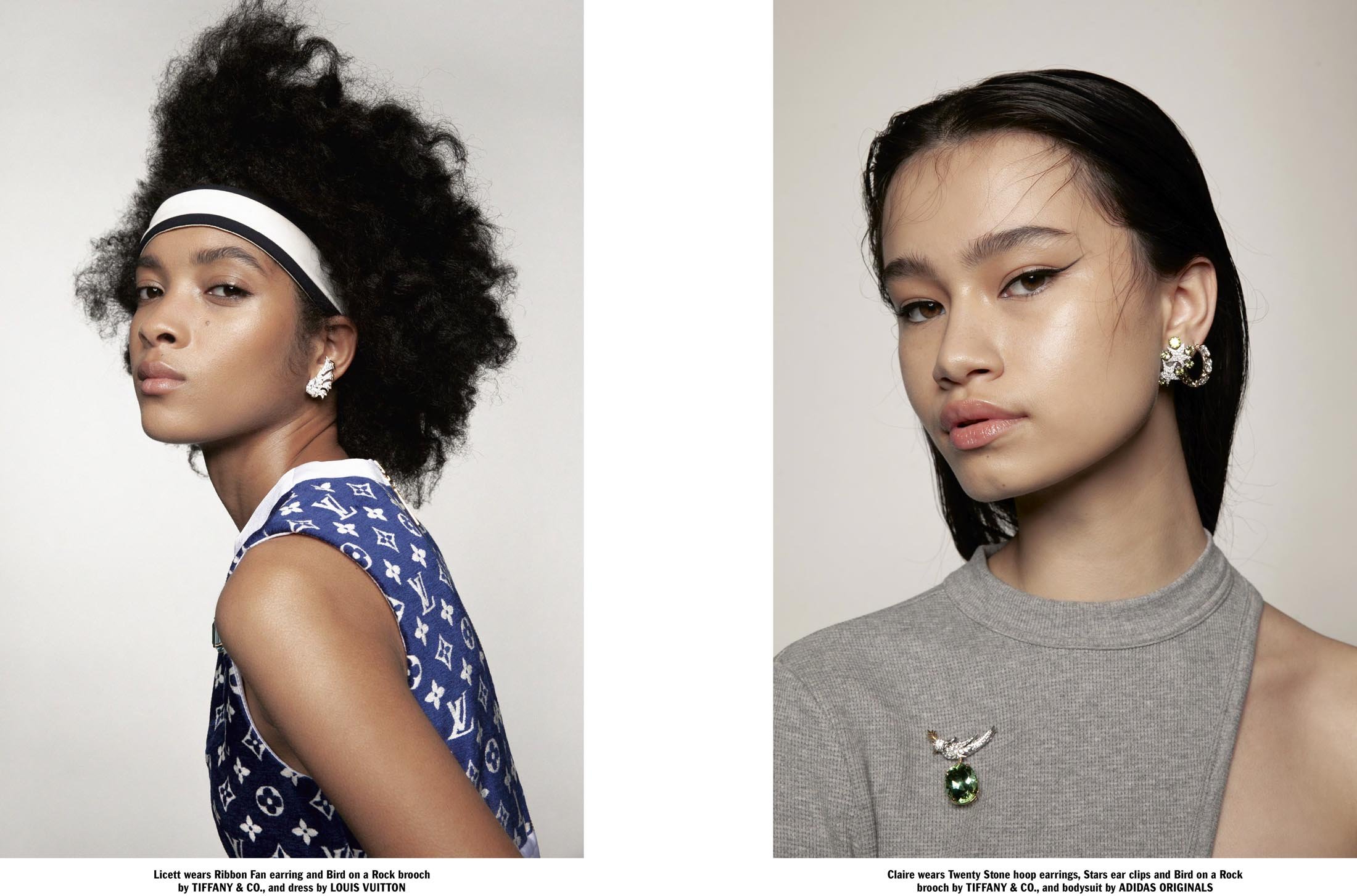 Two women pose in a photo studio wearing Tiffany & Co. earrings and brooches. One wears a Louis Vuitton dress, the other Adidas Originals.