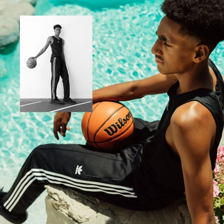 Monochrome composite photo of a young man in athletic wear seated with a basketball in color and a b/w version of him standing.