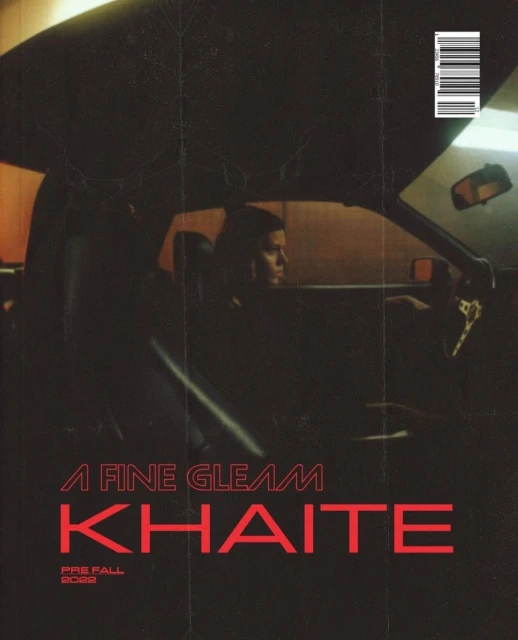 A woman is in a dark car on a magazine cover with red font. The cover features the title, “KHAITE” and “A FINE GLEAM PRE FALL 2022”.