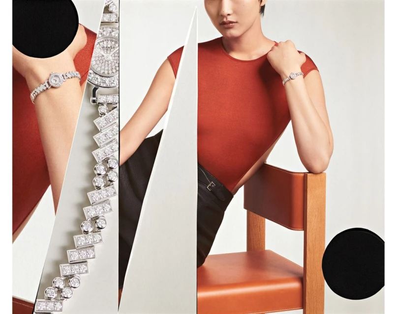 An elegant fashion advertisement featuring a woman wearing a diamond watch, posing on a chair with geometric color blocking design elements.
