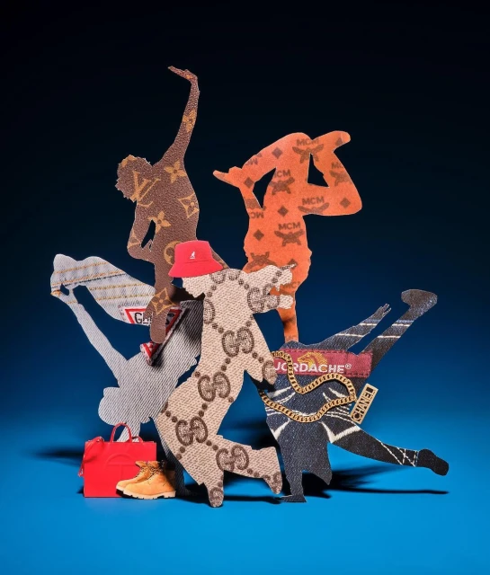 Collage of silhouette figures with fashion brand logos, arranged on a blue backdrop, showcasing creative artwork with luxury brand patterns.