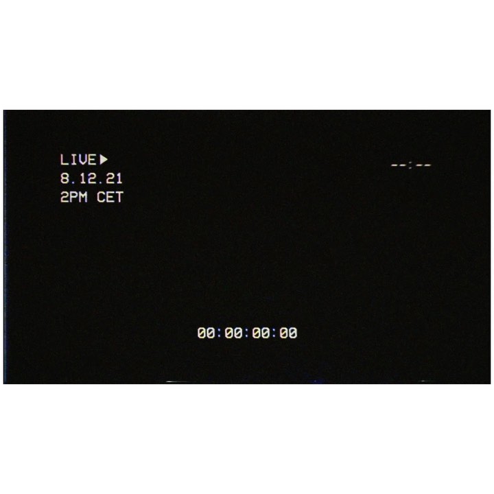 Black background with white text indicating 'LIVE' and date/time 8.12.21 2PM CET, plus a timestamp at the bottom of the frame.