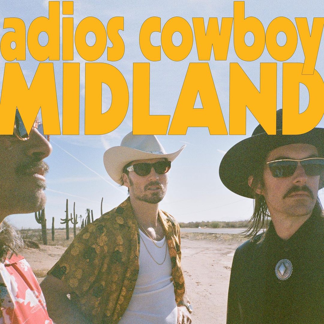 Album cover for Midland's 'Adios Cowboy' shows three adult males in hats and sunglasses in a desert landscape with cacti and a blue sky.