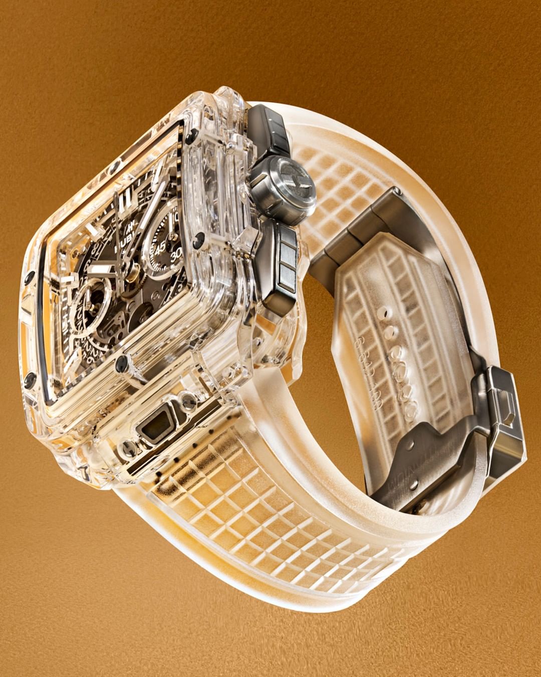 Luxury wristwatch with transparent case and rubber strap on a neutral background in a studio setting, showcasing intricate design and materials.