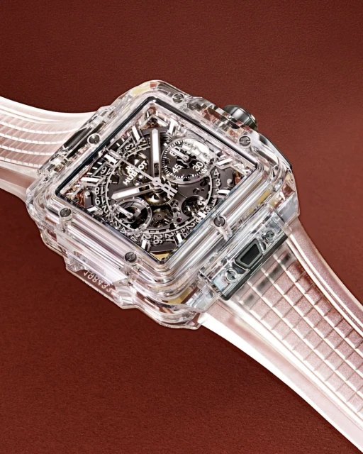 Close-up of a Hublot Spirit of Big Bang watch featuring a transparent case and band, showcasing the intricate inner workings of the timepiece.
