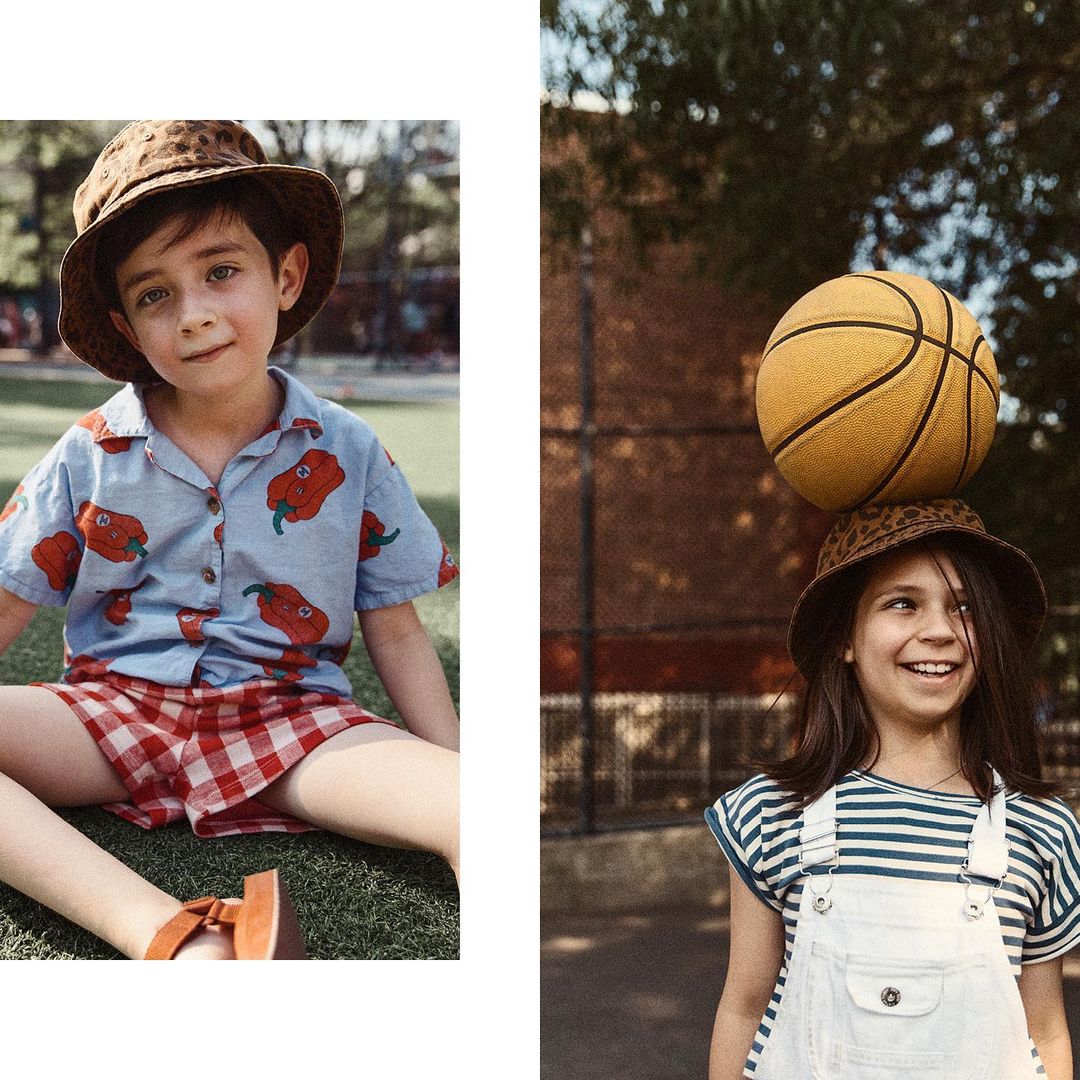 Two young children, one balancing a basketball on their head outdoors, are featured in a bright, natural-light fashion shot.