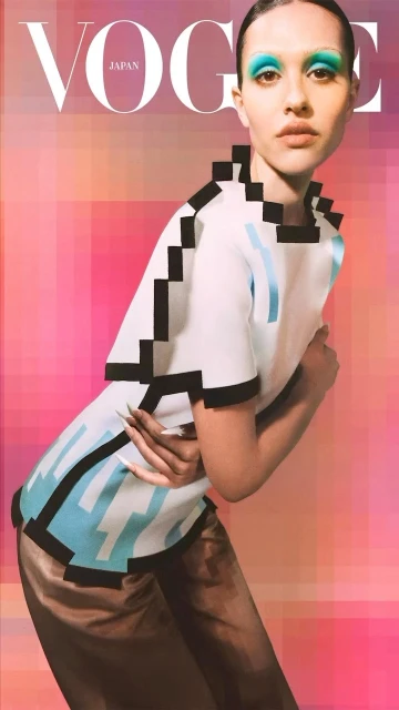 Vogue Japan cover featuring a woman with bold turquoise eyeshadow, wearing a white top with black pixelated trim, and gold pants.