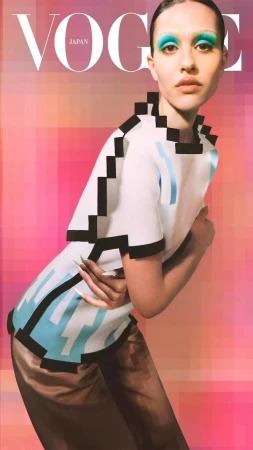 Vogue Japan cover featuring a woman with bold turquoise eyeshadow, wearing a white top with black pixelated trim, and gold pants.