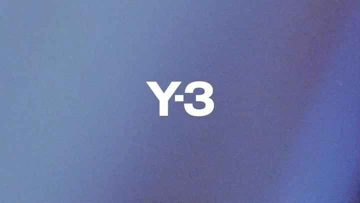 White Y-3 logo on gradient blue background. Fashion branding with simple minimalist logo design for visual marketing.