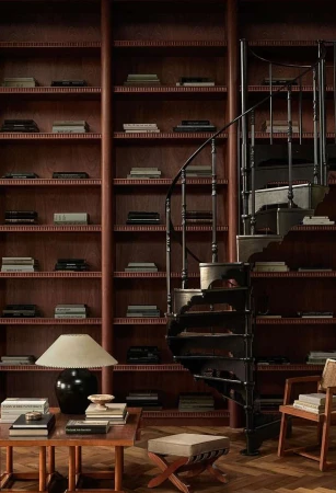 Interior view of a room with floor-to-ceiling bookshelves filled with books, a black spiral staircase, and wooden furniture.