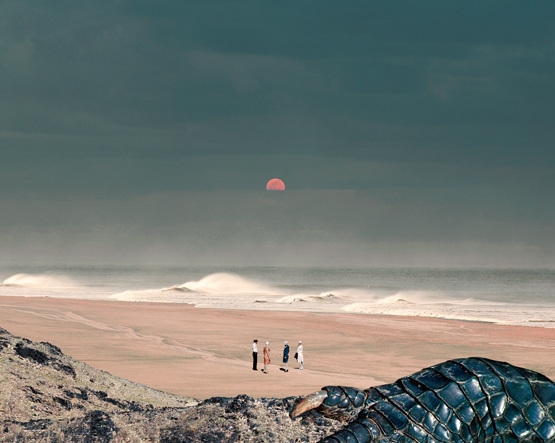 A surreal beach scene features four people in vintage clothing standing on the sand near water, under an orange sun, with a large reptile scale.