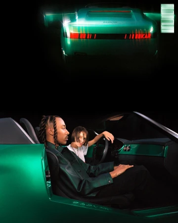A stylish automotive shoot featuring a green sports car with two people inside, showcasing a luxury vehicle with custom bodywork.