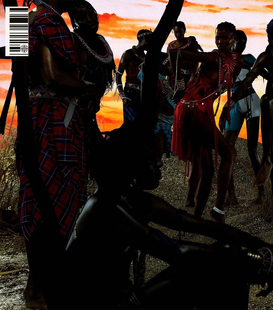 Several Masai people in traditional clothing are gathered outdoors against a colorful sunset sky in a vibrant artistic style.
